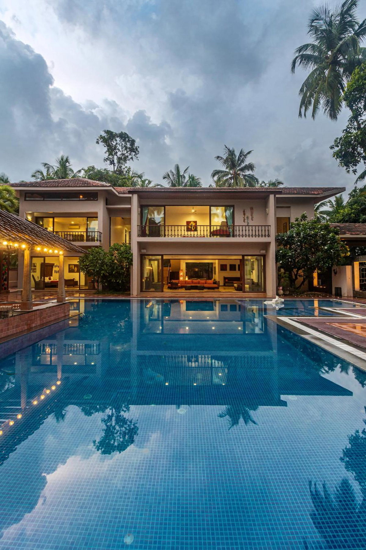 Hotel · SaffronStays Casa Del Palms - 8BR luxury pool villa with gazebo, pickleball, bar & lawns near Nagaon Beach, Alibaug