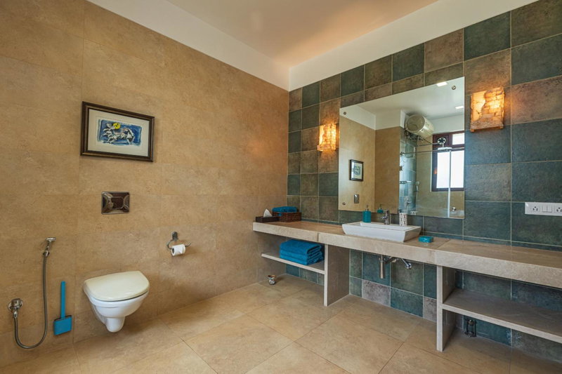 SaffronStays Casa Del Palms - 8BR luxury pool villa with gazebo, pickleball, bar & lawns near Nagaon Beach, Alibaug, India