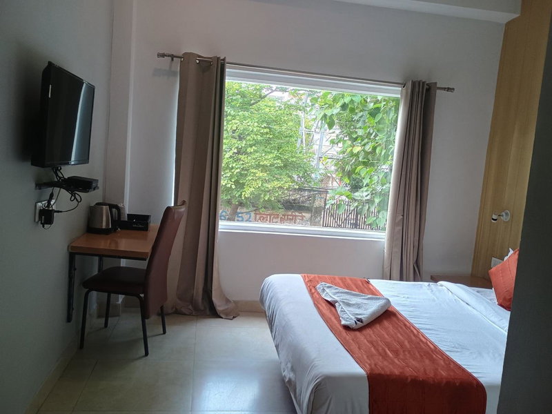 Super Townhouse Oak Arvindo Park Indira Nagar Formerly Rama Inn, Vibhuti Khand, India