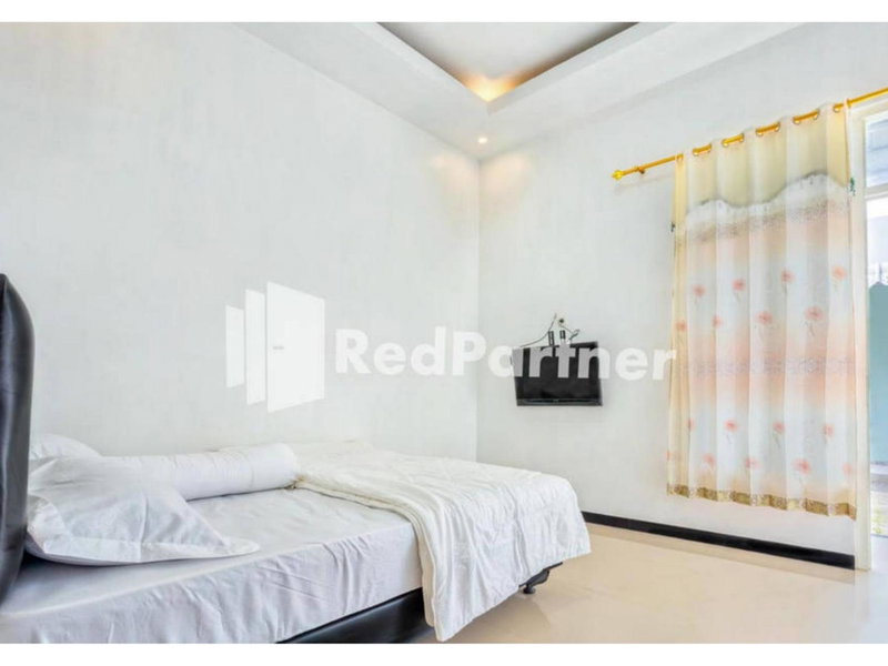 Griya Rahayu Guesthouse Mitra RedDoorz near Jatim Park 2 Batu, Tlekung, Indonesia
