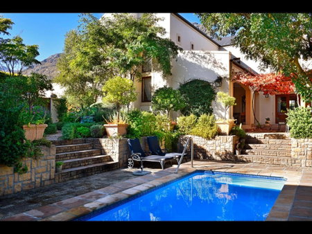 Petit Plaisir is a romantic self-catering cottage on the side of the village no2, Franschhoek, South Africa