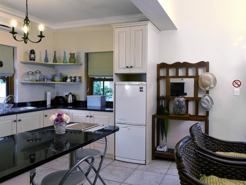 Petit Plaisir is a romantic self-catering cottage on the side of the village no2, Franschhoek, South Africa
