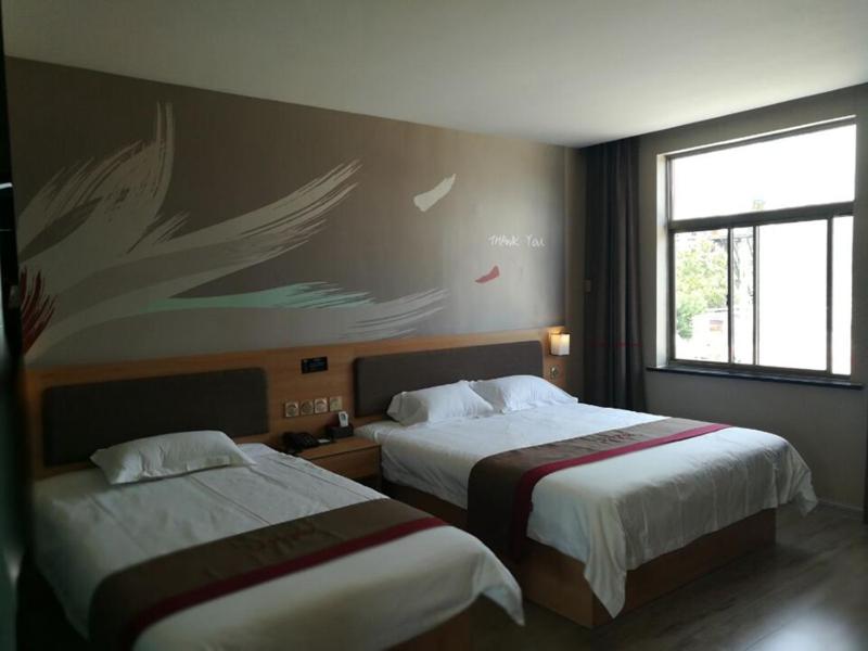Thank Inn Chain Hotel Shandong jining zoucheng tang town yingbin avenue, Jining, China