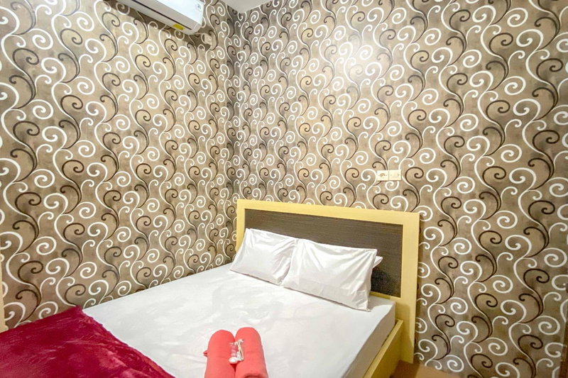 Tini's Guest House Malang Mitra RedDoorz, Betek, Indonesia