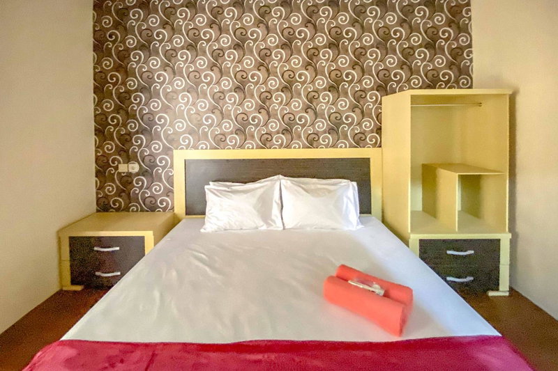Tini's Guest House Malang Mitra RedDoorz, Betek, Indonesia