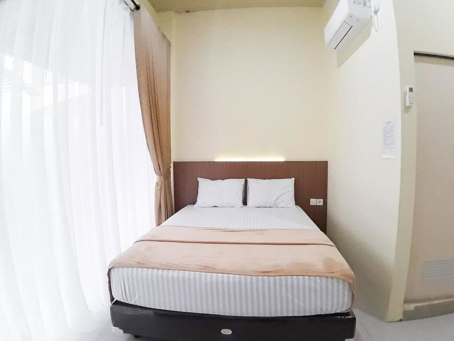 RedDoorz Syariah near Transmart Jambi 2, Paalmerah, Indonesia