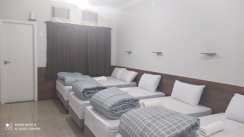 Pousada Quarto Suíte Famíliar com ar,frigobar, wi fi e garagem, Aparecida, Brazil
