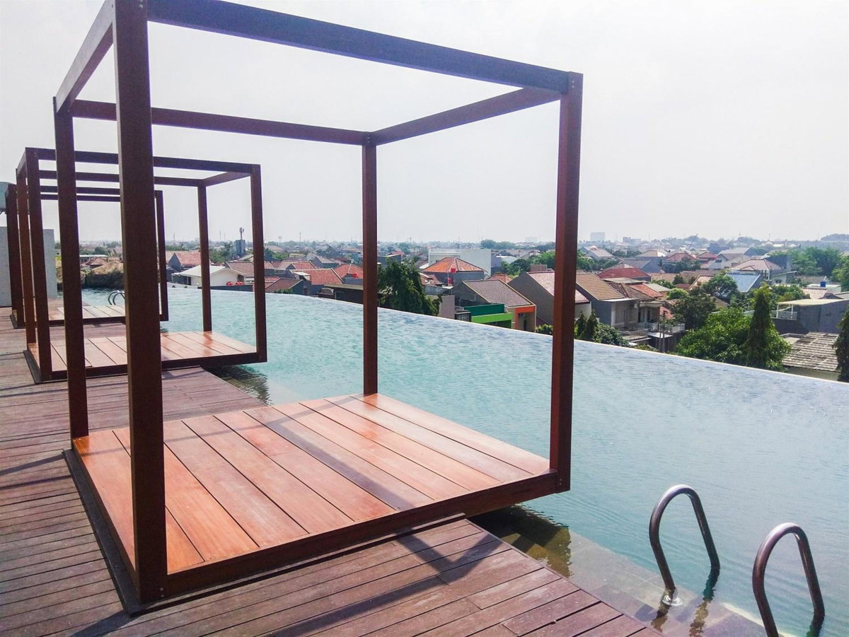 Grand Kamala Lagoon Studio Apartment with Modern Interior By Travelio, Indonesia