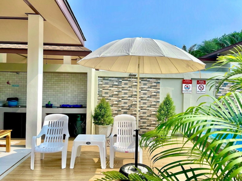 Le poulet poolvilla khanom, Khanom, Thailand