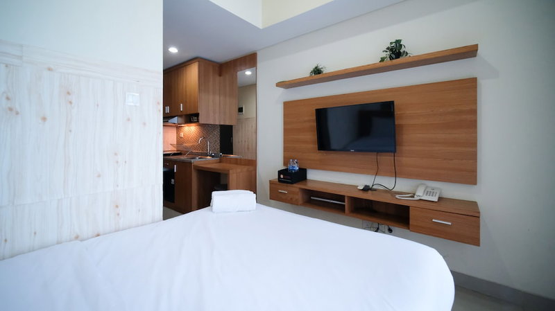 Strategic And Homey Studio At Tamasari Papilio Apartment, Surabaya, Indonesia