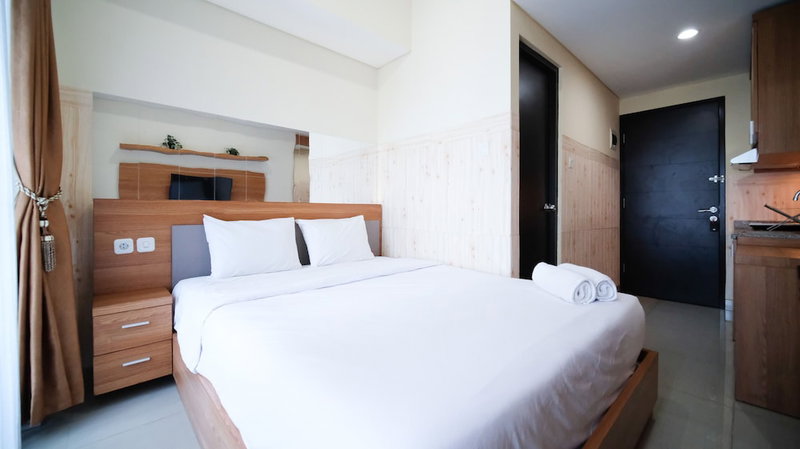 Strategic And Homey Studio At Tamasari Papilio Apartment, Surabaya, Indonesia