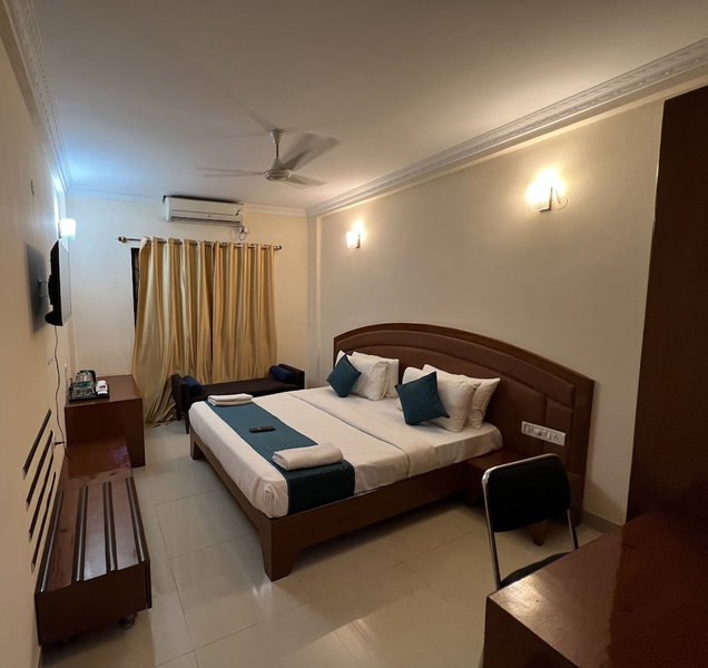 Blue Bliss Hotels By PPH Living Infantry Road, Bengaluru, India
