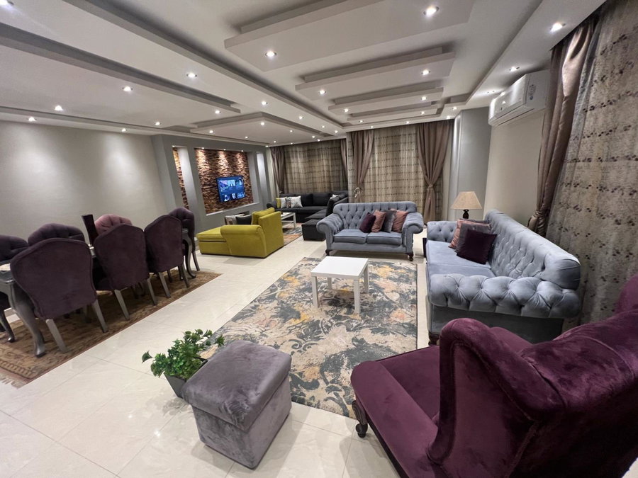 Cozy and Modern Apartment for Rent in Mohandessin, Cairo, Египет