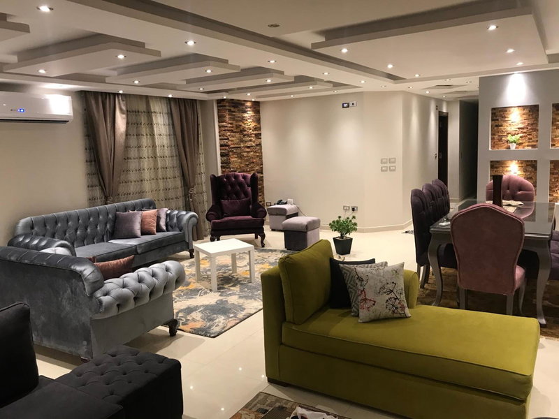 Cozy and Modern Apartment for Rent in Mohandessin, Cairo, Египет