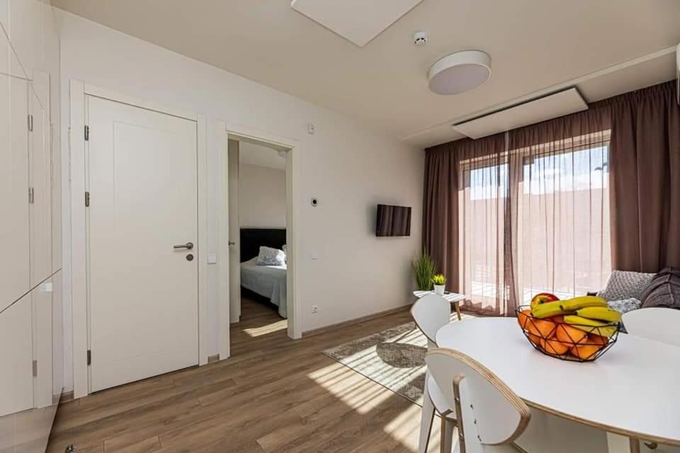Saulės apartamentai, Lituanie
