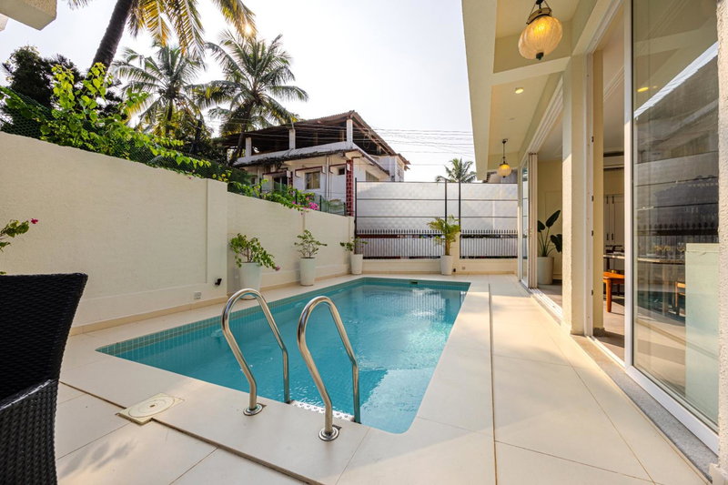 ELIVAAS Signature 4 BHK Villa near Beach with Private Pool & Bar - Casa Boa Vida, Goa, India