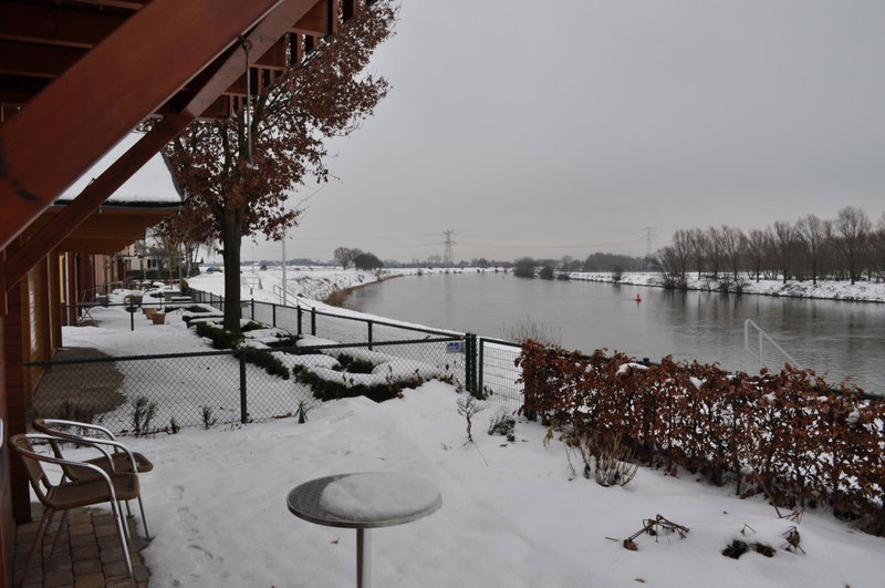 Thuiskomen, genieten aan het water, Maaseik, Belgium