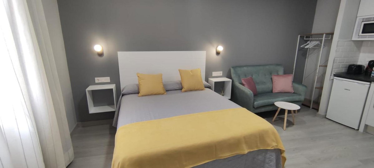 Hotel · Apartamentos Harmonía, Merida